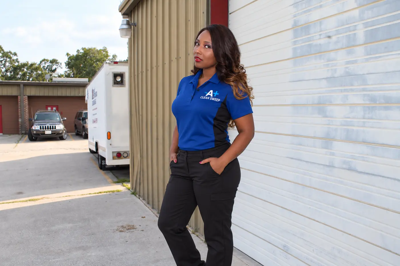 April in an A+ Clean Sweep uniform