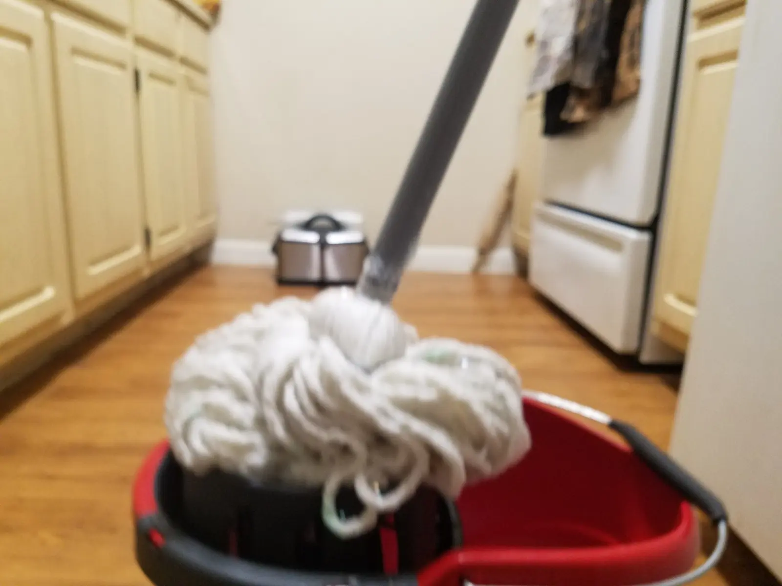 Floor-cleaning equipment in a kitchen